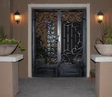 custom iron gate with arches, double rail, an scrolls
