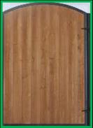 Our standard arched gate with stained, tongue and grouve wood.